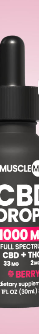 A bottle of MuscleMX Balance CBD Drops with a dropper, labeled as having 1000 mg full spectrum CBD and 2mg THC